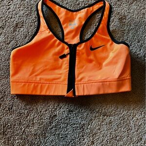 Nike Pro Sports Bra. Size Medium. Front zip. Racerback. Neon orange
Dri-Fit